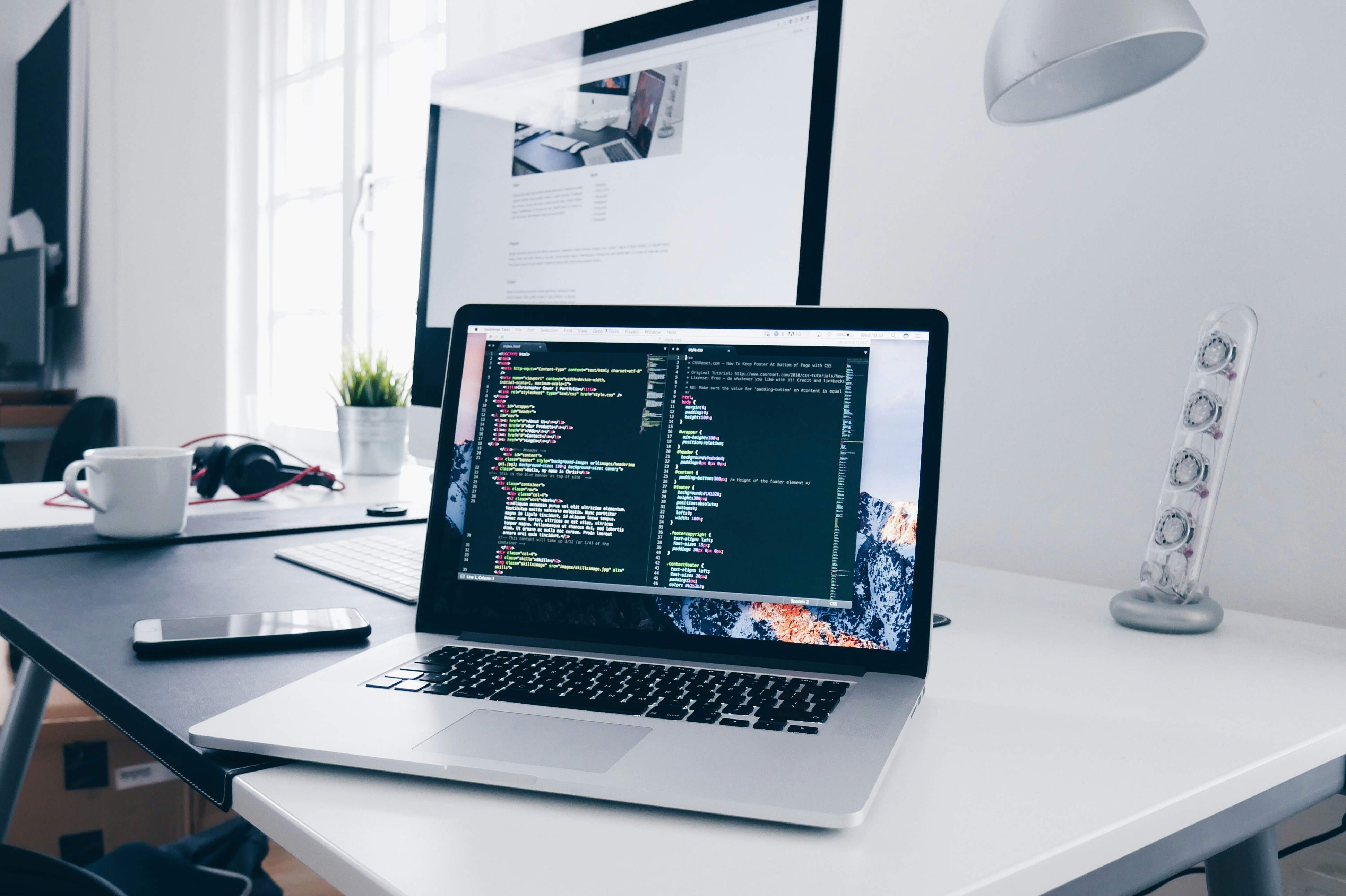 Website builders comparison: SiteBot vs Framer, Webflow, v0 - Photo by Christopher Gower on Unsplash